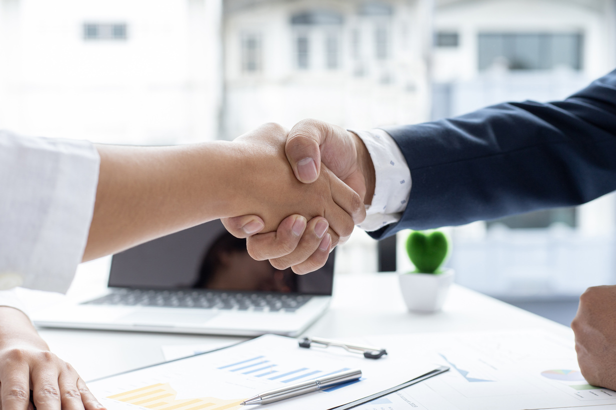 Colleagues Shaking Hand After Successful Deal